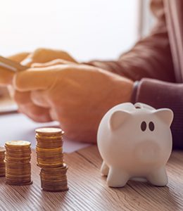Image of Piggy Bank and Change for Savings Bonds