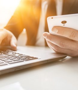 Image of Person Using Mobile Banking for eStatement